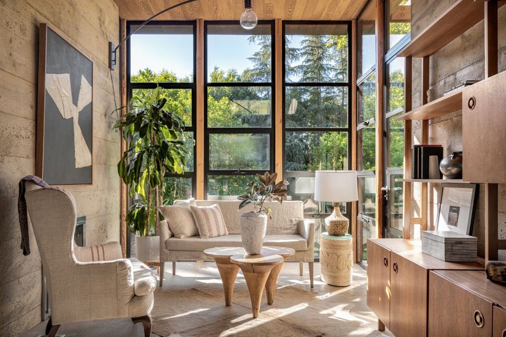 The Architectural Masterpiece in Encino is made up of a series of board-formed concrete, wood and glass pavilions connected by gallery spaces now available for sale. This home located at 4411 Noeline Ave, Encino, California
