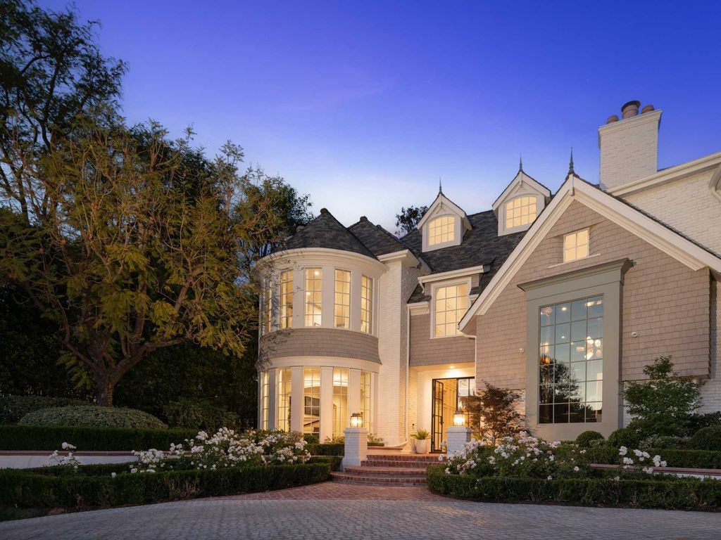 The Home in Encino is an East Hamptons style property offers resort-style living within the prestigious guard-gated Royal Oaks Colony now available for sale. This home located at 11630 Moraga Ln, Encino, California