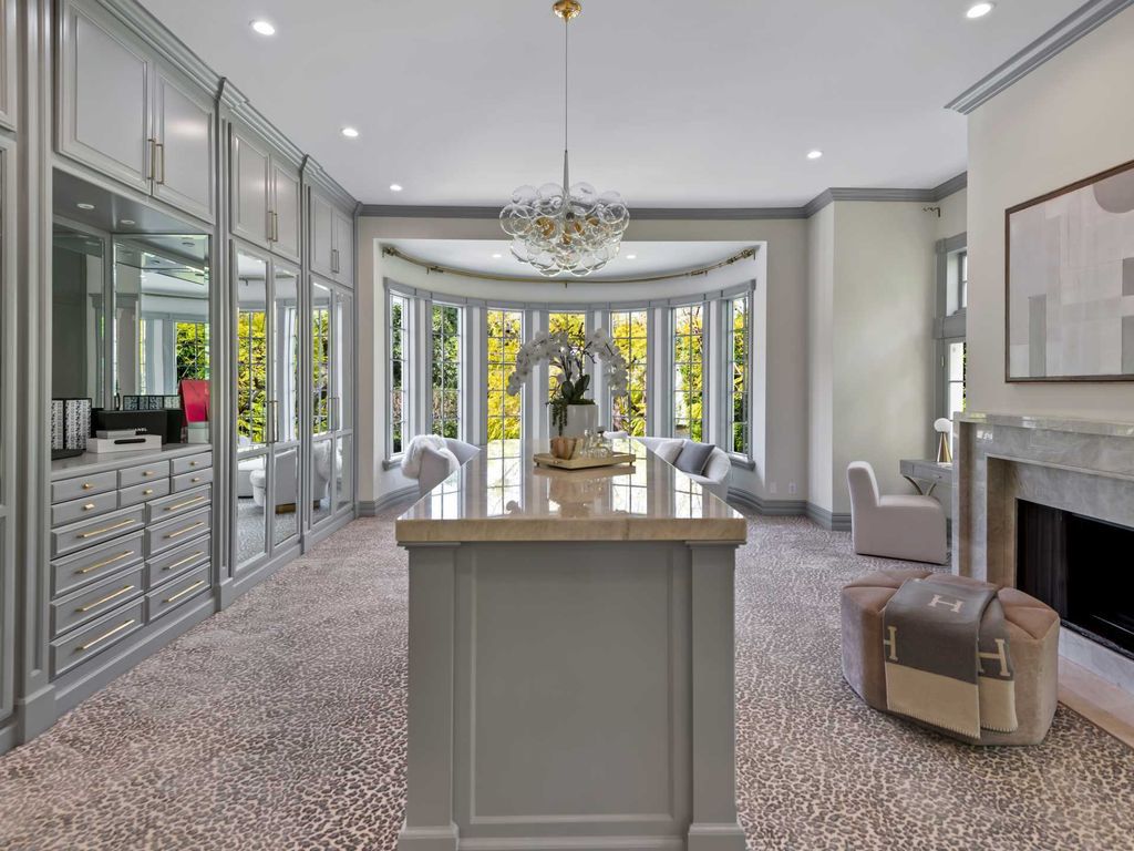 The Home in Encino is an East Hamptons style property offers resort-style living within the prestigious guard-gated Royal Oaks Colony now available for sale. This home located at 11630 Moraga Ln, Encino, California