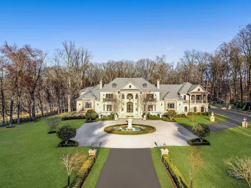 The Estate in Virginia has elegance outdoor areas with an extensive limestone patio surrounding the mosaic-lined swimming pool, now available for sale