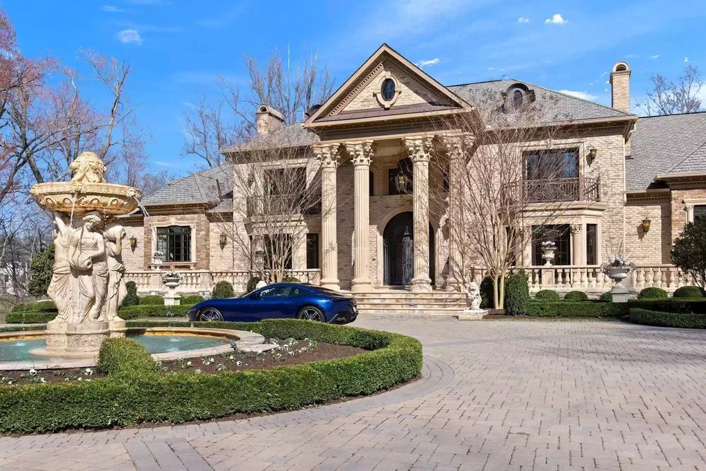 The Estate in Virginia has elegance outdoor areas with an extensive limestone patio surrounding the mosaic-lined swimming pool, now available for sale