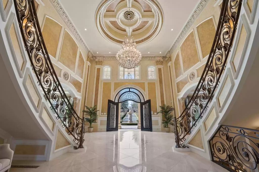 The Estate in Virginia has elegance outdoor areas with an extensive limestone patio surrounding the mosaic-lined swimming pool, now available for sale