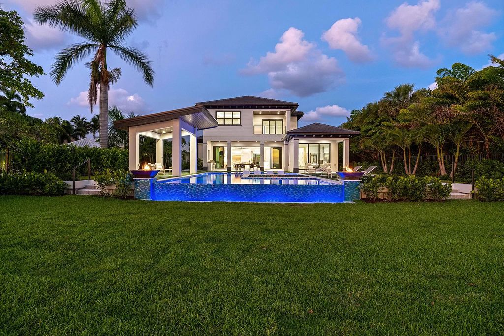 The Home in Lake Worth is a brand new construction on Hypoluxo Island with stunning modern contemporary design and insane wide Intracoastal views now available for sale. This home located at 701 S Atlantic Dr, Lake Worth, Florida