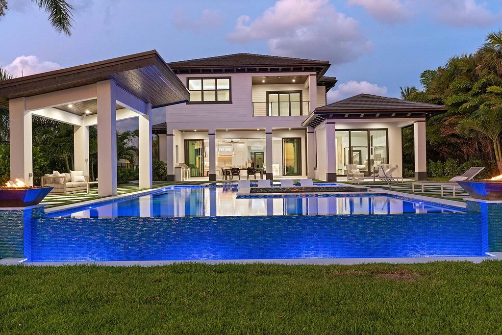 The Home in Lake Worth is a brand new construction on Hypoluxo Island with stunning modern contemporary design and insane wide Intracoastal views now available for sale. This home located at 701 S Atlantic Dr, Lake Worth, Florida