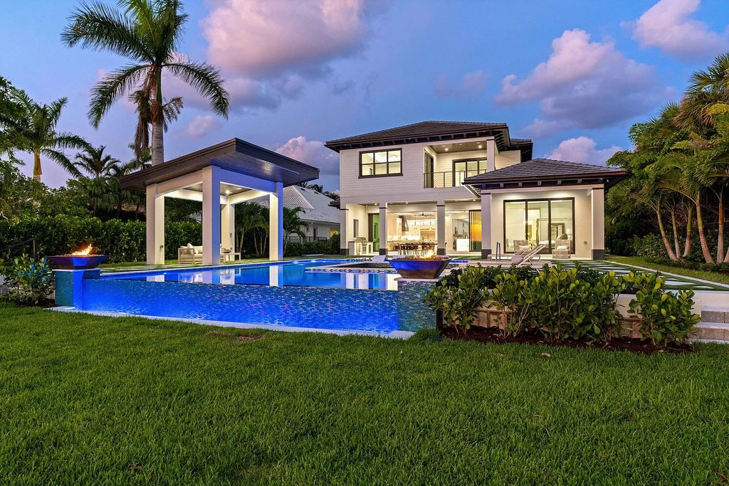 The Home in Lake Worth is a brand new construction on Hypoluxo Island with stunning modern contemporary design and insane wide Intracoastal views now available for sale. This home located at 701 S Atlantic Dr, Lake Worth, Florida