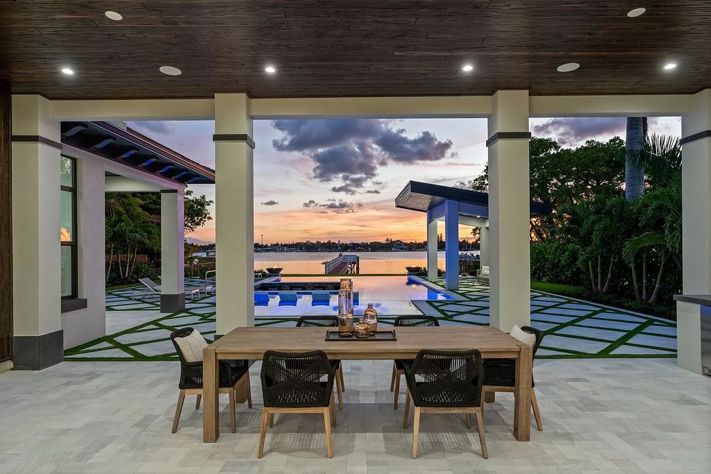 The Home in Lake Worth is a brand new construction on Hypoluxo Island with stunning modern contemporary design and insane wide Intracoastal views now available for sale. This home located at 701 S Atlantic Dr, Lake Worth, Florida