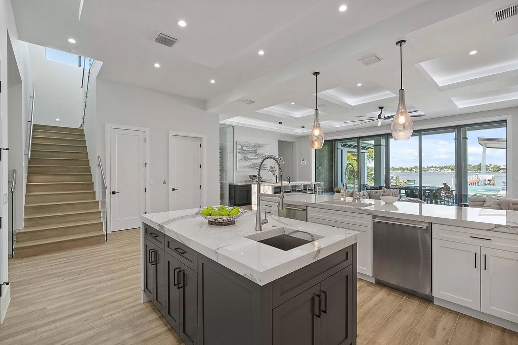 The Home in Lake Worth is a brand new construction on Hypoluxo Island with stunning modern contemporary design and insane wide Intracoastal views now available for sale. This home located at 701 S Atlantic Dr, Lake Worth, Florida