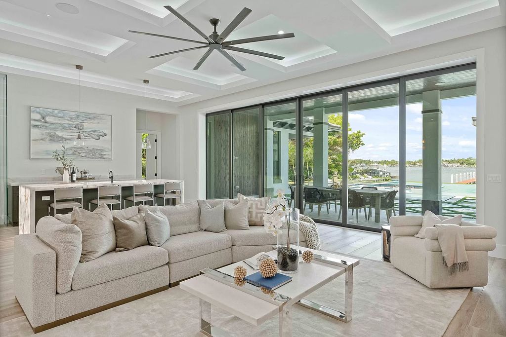 The Home in Lake Worth is a brand new construction on Hypoluxo Island with stunning modern contemporary design and insane wide Intracoastal views now available for sale. This home located at 701 S Atlantic Dr, Lake Worth, Florida