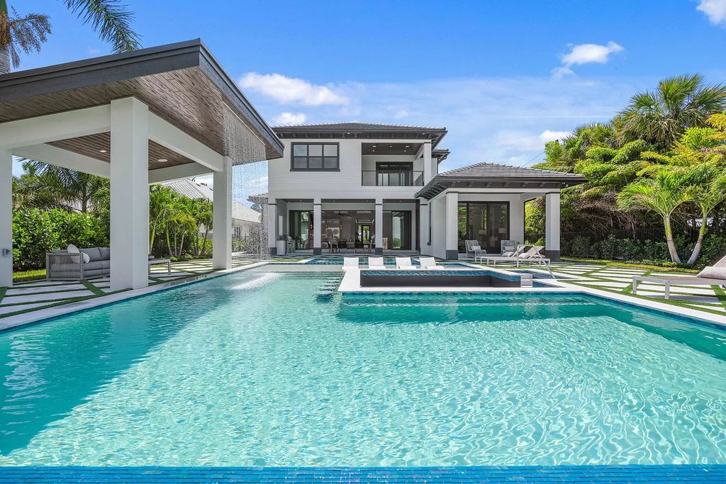 The Home in Lake Worth is a brand new construction on Hypoluxo Island with stunning modern contemporary design and insane wide Intracoastal views now available for sale. This home located at 701 S Atlantic Dr, Lake Worth, Florida