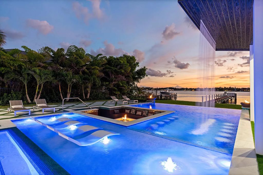 The Home in Lake Worth is a brand new construction on Hypoluxo Island with stunning modern contemporary design and insane wide Intracoastal views now available for sale. This home located at 701 S Atlantic Dr, Lake Worth, Florida