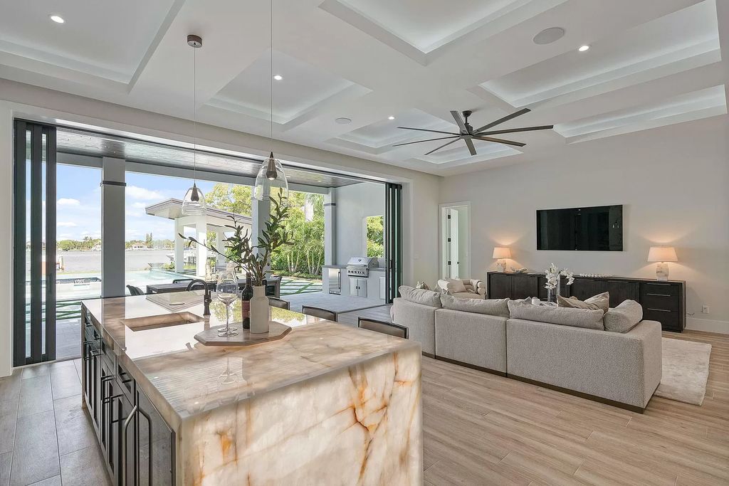 The Home in Lake Worth is a brand new construction on Hypoluxo Island with stunning modern contemporary design and insane wide Intracoastal views now available for sale. This home located at 701 S Atlantic Dr, Lake Worth, Florida