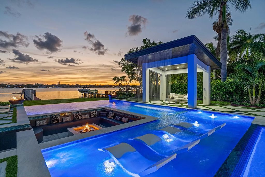 The Home in Lake Worth is a brand new construction on Hypoluxo Island with stunning modern contemporary design and insane wide Intracoastal views now available for sale. This home located at 701 S Atlantic Dr, Lake Worth, Florida