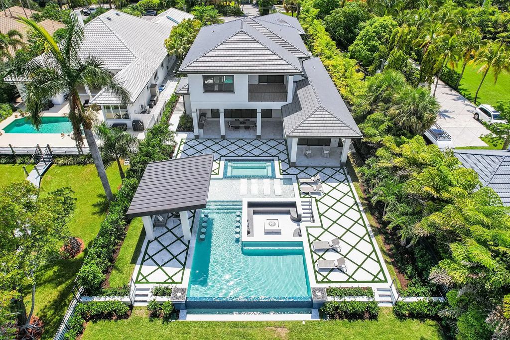 The Home in Lake Worth is a brand new construction on Hypoluxo Island with stunning modern contemporary design and insane wide Intracoastal views now available for sale. This home located at 701 S Atlantic Dr, Lake Worth, Florida