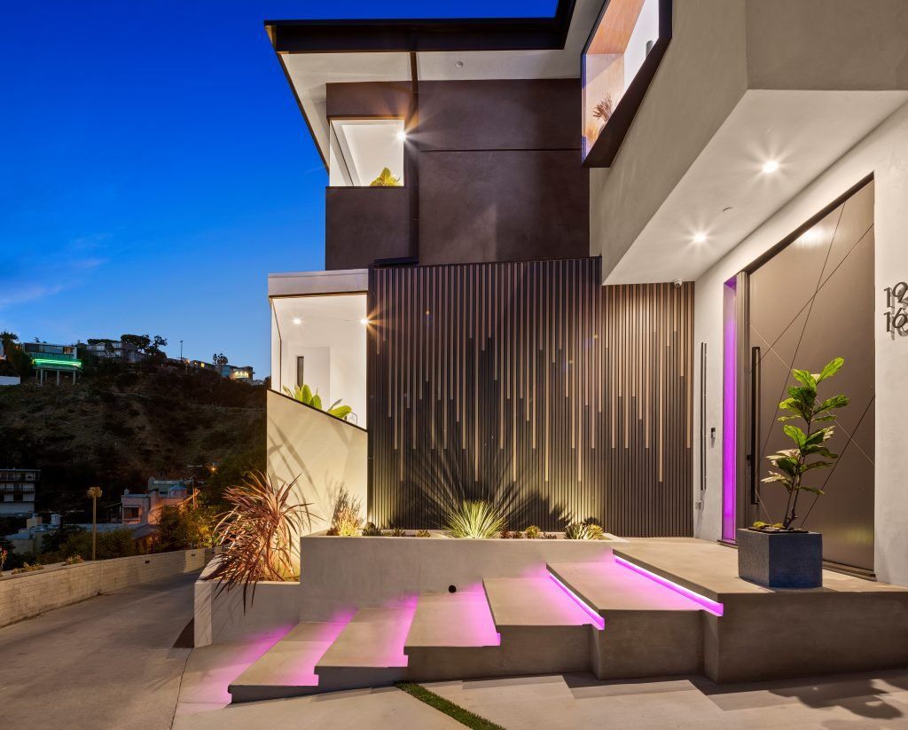 The Home in Los Angeles is a spectacular residence on a private drive off Sunset Plaza with breathtaking panoramic downtown views now available for sale. This home located at 1916 Sunset Plaza Dr, Los Angeles, California
