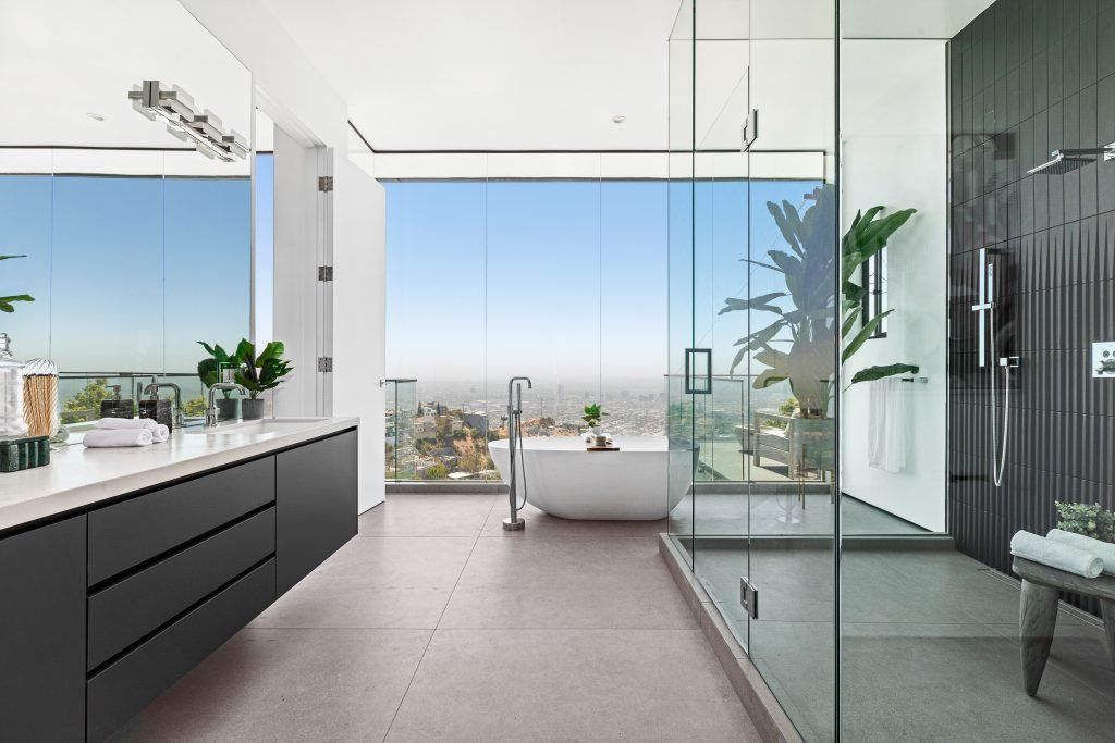 The Home in Los Angeles is a spectacular residence on a private drive off Sunset Plaza with breathtaking panoramic downtown views now available for sale. This home located at 1916 Sunset Plaza Dr, Los Angeles, California