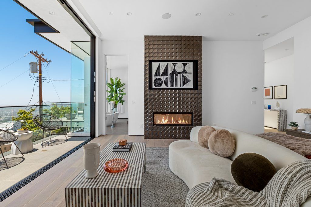 The Home in Los Angeles is a spectacular residence on a private drive off Sunset Plaza with breathtaking panoramic downtown views now available for sale. This home located at 1916 Sunset Plaza Dr, Los Angeles, California