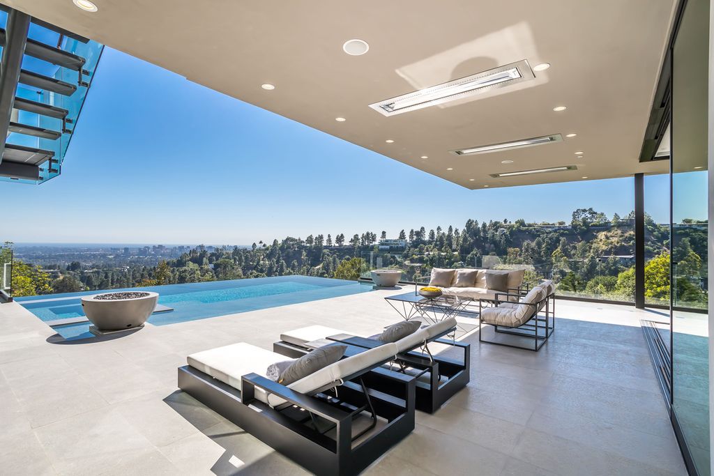 The Mansion in Beverly Hills is an architectural masterpiece set on was built with the finest materials creating an unprecedented living experience  the prestigious Crest Streets now available for sale. This home located at 9406 Lloydcrest Dr, Beverly Hills, California