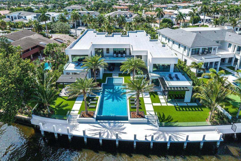 The Mansion in Boca Raton is a brand new waterfront Signature Estate built by SRD Building Corp a premier oversized lot now available for sale. This home located at 372 E Alexander Palm Rd, Boca Raton, Florida