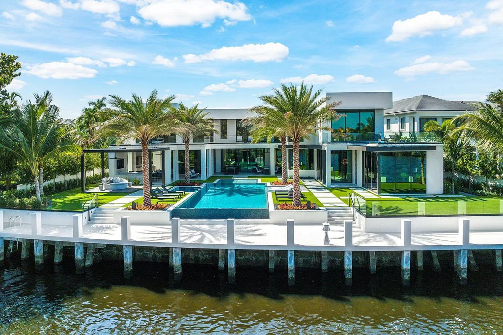 The Mansion in Boca Raton is a brand new waterfront Signature Estate built by SRD Building Corp a premier oversized lot now available for sale. This home located at 372 E Alexander Palm Rd, Boca Raton, Florida