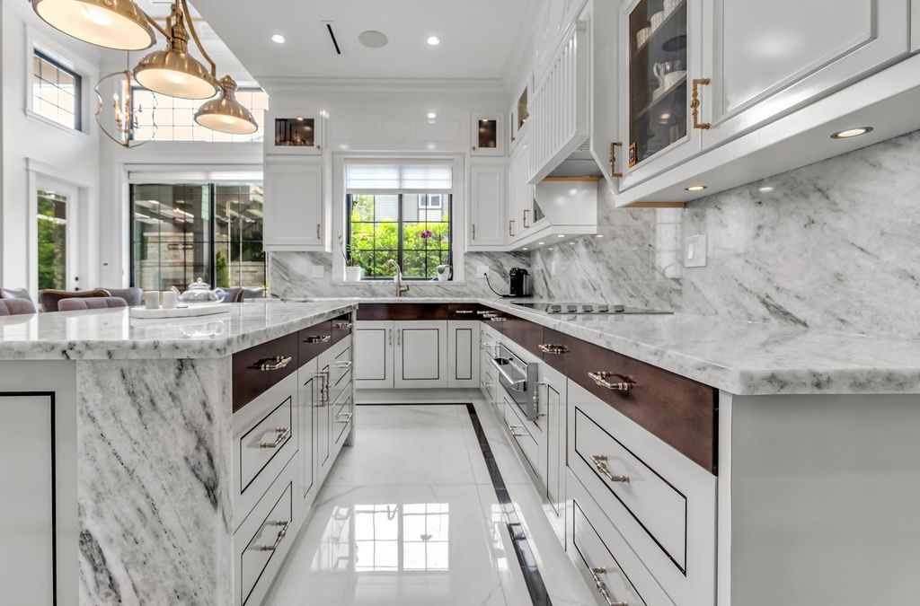The Home in Richmond is an absolutely stunnig custom built home with dream gourmet kitchen, an amazing glass wine cellar and bar, now available for sale. This home located at 7168 Gilhurst Cres, Richmond, BC V7A 1N9, Canada