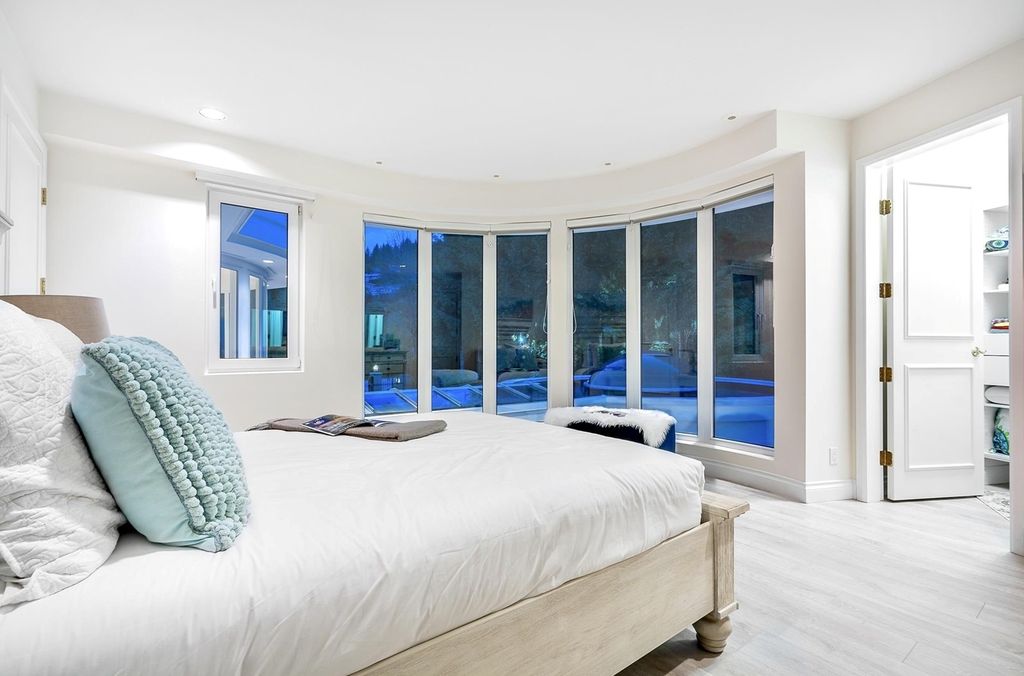 The Residence in West Vancouver offers breathtaking panoramic views of Vancouver’s skyline and gorgeous inner harbour, now available for sale. This home located at 1409 Chartwell Dr, West Vancouver, BC V7S 2R7, Canada
