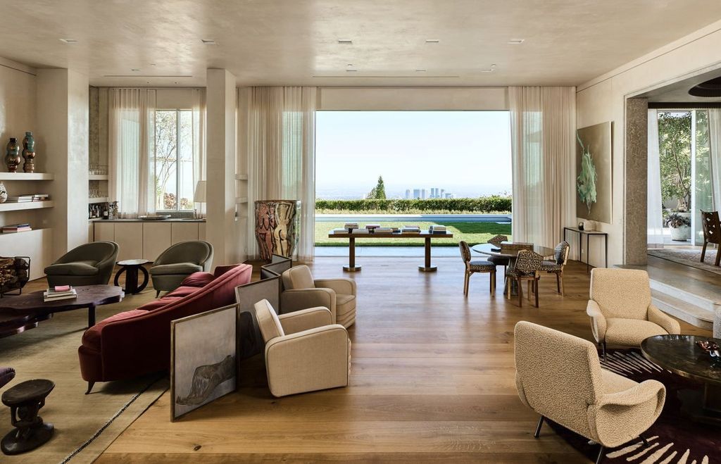 The Mansion in Los Angeles is a contemporary masterpiece with impressive views, inspired design, and a serenely secluded location with gated access now available for sale. This home located at 335 Trousdale Pl, Beverly Hills, California