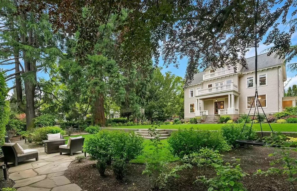 The Estate in Washington is a luxurious home surrounded by lush greenery and majestic trees now available for sale. This home located at 3816 E Garfield Street, Seattle, Washington; offering 06 bedrooms and 05 bathrooms with 5,328 square feet of living spaces.