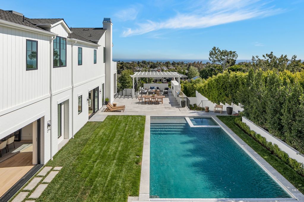 The Home in Pacific Palisades is a newly constructed estate evokes grand, traditional charm, coupled with contemporary flair now available for sale. This home located at 15975 Alcima Ave, Pacific Palisades, California