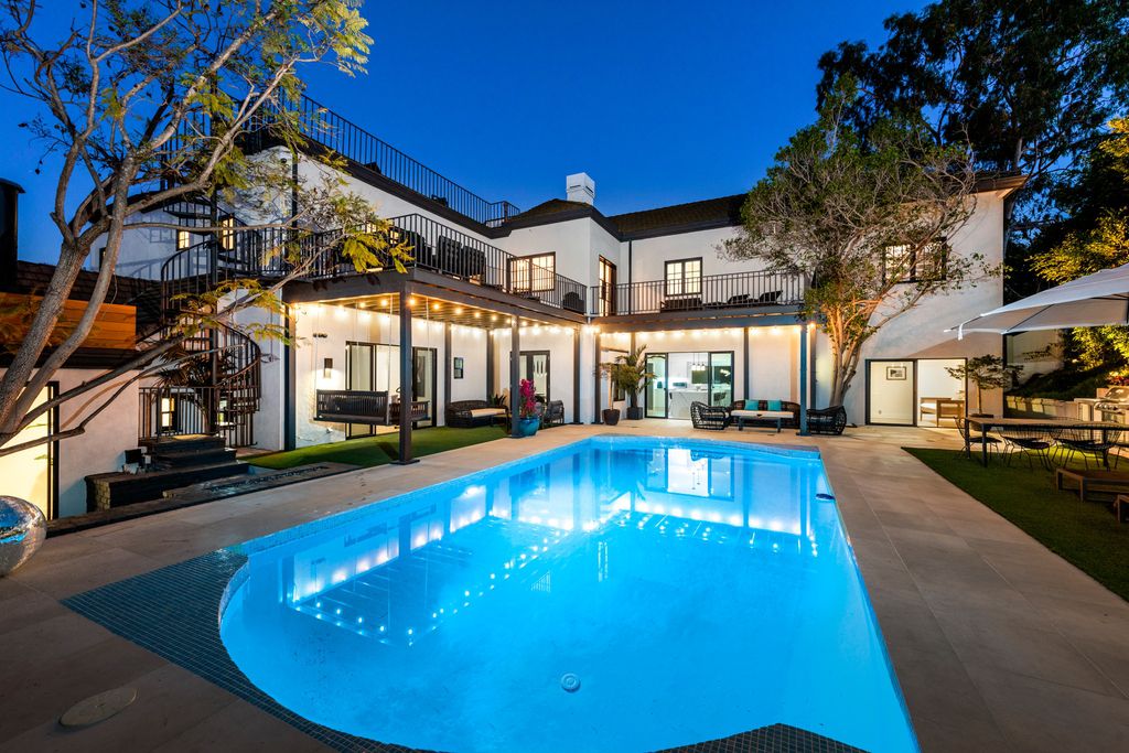 The Home in Los Angeles is a one-of-a-kind transitional estate on a beautiful tree lined street in the prestigious neighborhood of Little Holmby now available for sale. This home located at 10401 Wyton Dr, Los Angeles, California