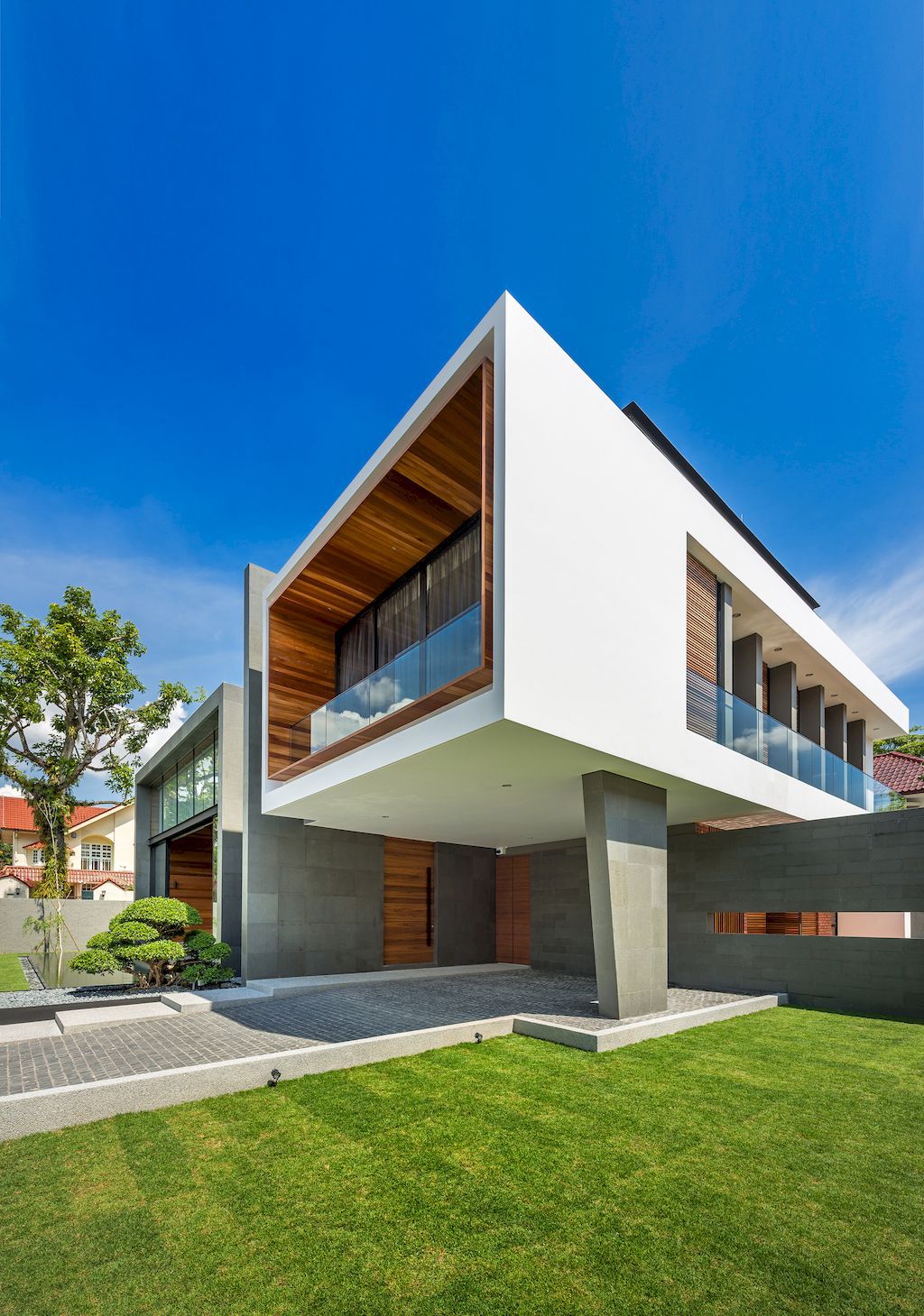 Mimosa Road house for a warm, rustic touch by Park + Associates Pte Ltd