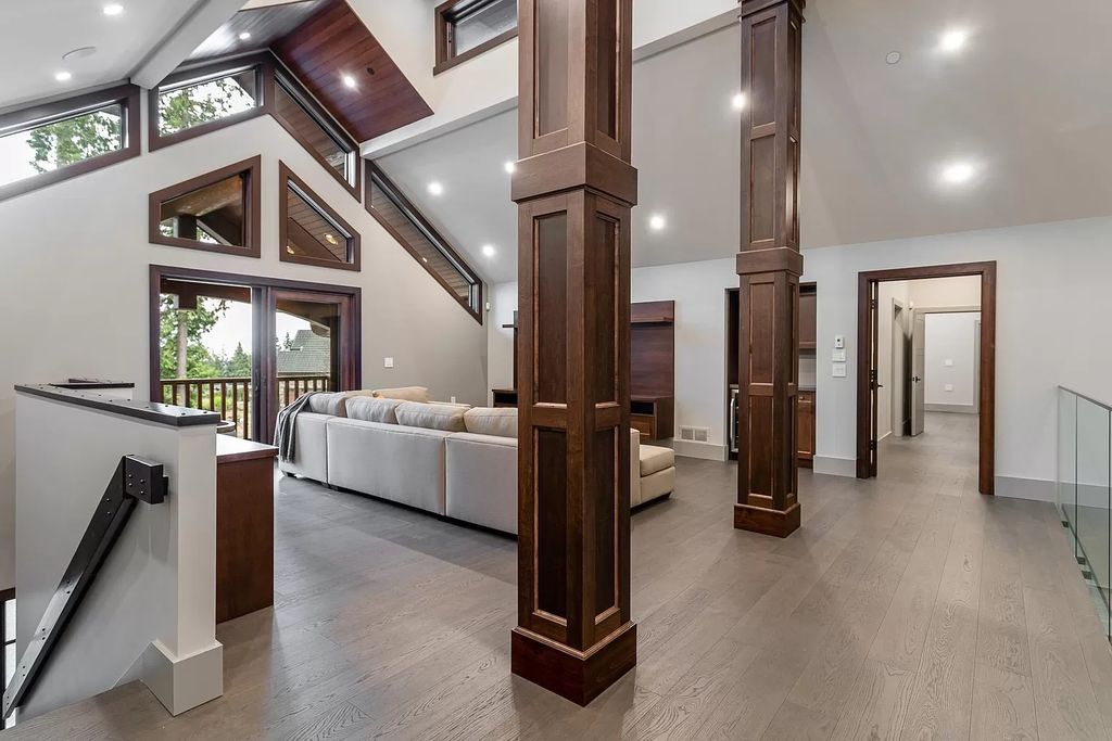 The Estate in Anmore offers an open concept flows from room to room & showcases the masterful workmanship throughout, now available for sale. This home located at 3299 Black Bear Way, Anmore, BC V3H 5G6, Canada