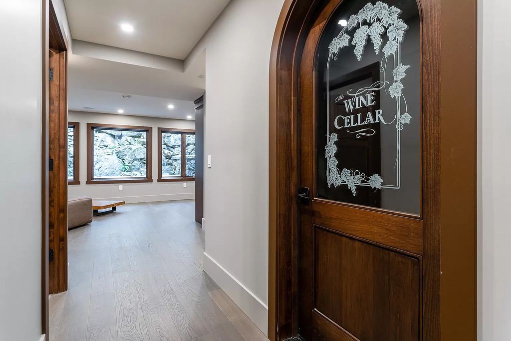 The Estate in Anmore offers an open concept flows from room to room & showcases the masterful workmanship throughout, now available for sale. This home located at 3299 Black Bear Way, Anmore, BC V3H 5G6, Canada