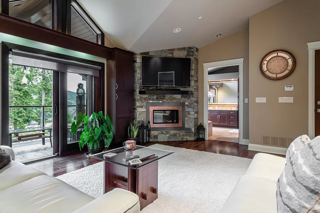 The Estate in Anmore offers an open concept flows from room to room & showcases the masterful workmanship throughout, now available for sale. This home located at 3299 Black Bear Way, Anmore, BC V3H 5G6, Canada