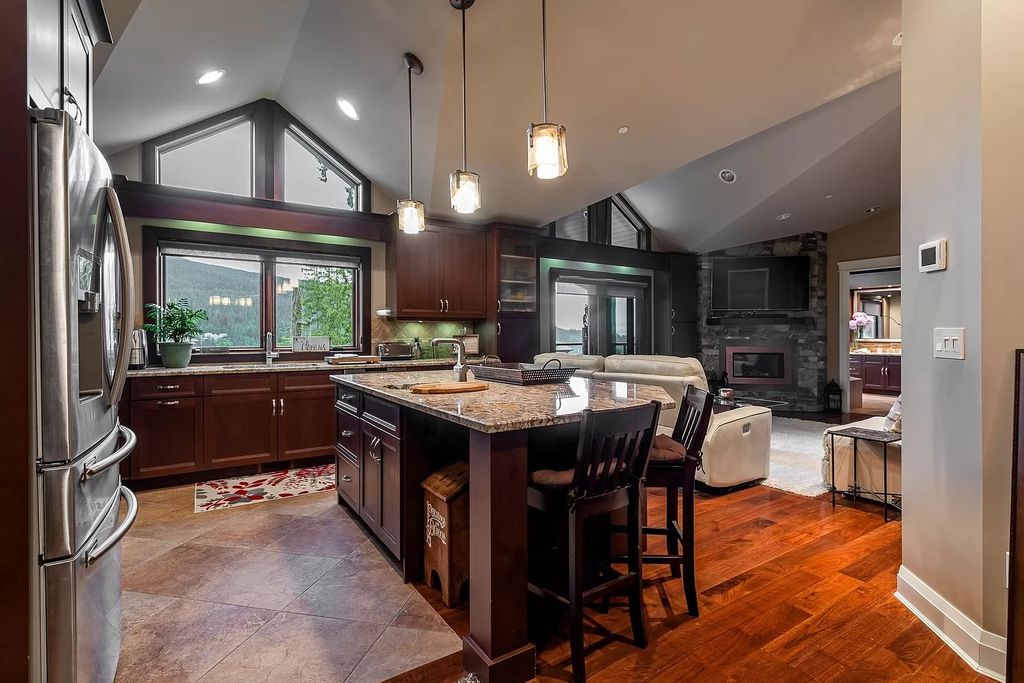 The Estate in Anmore offers an open concept flows from room to room & showcases the masterful workmanship throughout, now available for sale. This home located at 3299 Black Bear Way, Anmore, BC V3H 5G6, Canada