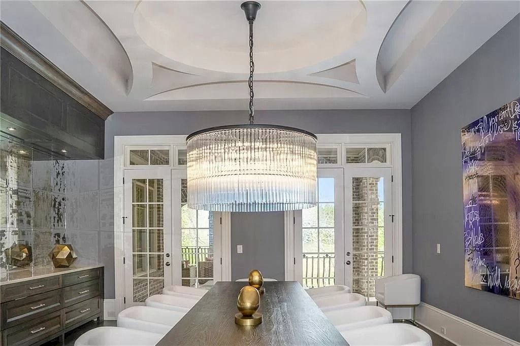 The Estate in Georgia is a luxurious home equipped with luxurious woodwork, trim, flooring, tile, plumbing fixtures and light fixtures now available for sale. This home located at 3150 Manor Bridge Dr, Milton, Georgia; offering 06 bedrooms and 10 bathrooms with 16,000 square feet of living spaces.