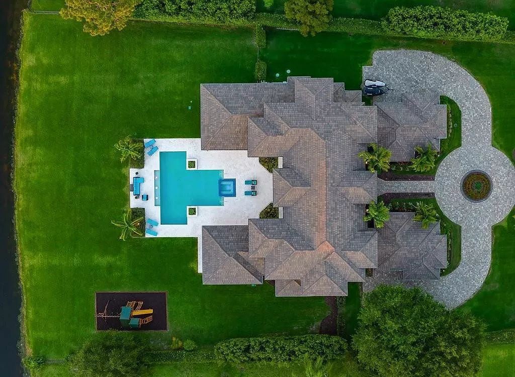 The Home in Naples is a spectacular estate in the sought-after community of Pine Ridge Estates has been masterfully designed for absolute privacy and opulence now available for sale. This home located at 119 Carica Rd, Naples, Florida