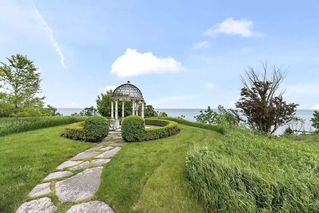 The Home in Illinois is a luxurious home commanding outstanding panoramic and unobstructed views of lake Michigan available for sale. This home located at 700 Crab Tree Ln, Lake Bluff, Illinois; offering 06 bedrooms and 08 bathrooms with 9,990 square feet of living spaces.
