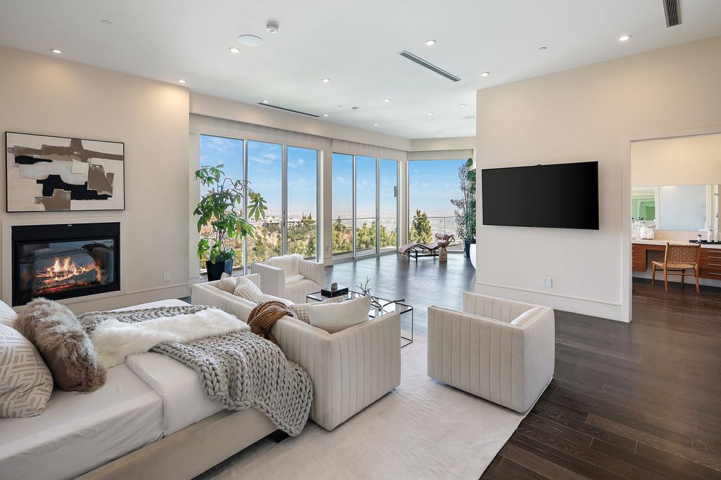 The Los Angeles Home is a custom built estate has 7,000 square foot of outdoor entertainment terraces with the views of the world now available for sale. This home located at 9369 Nightingale Dr, Los Angeles, California