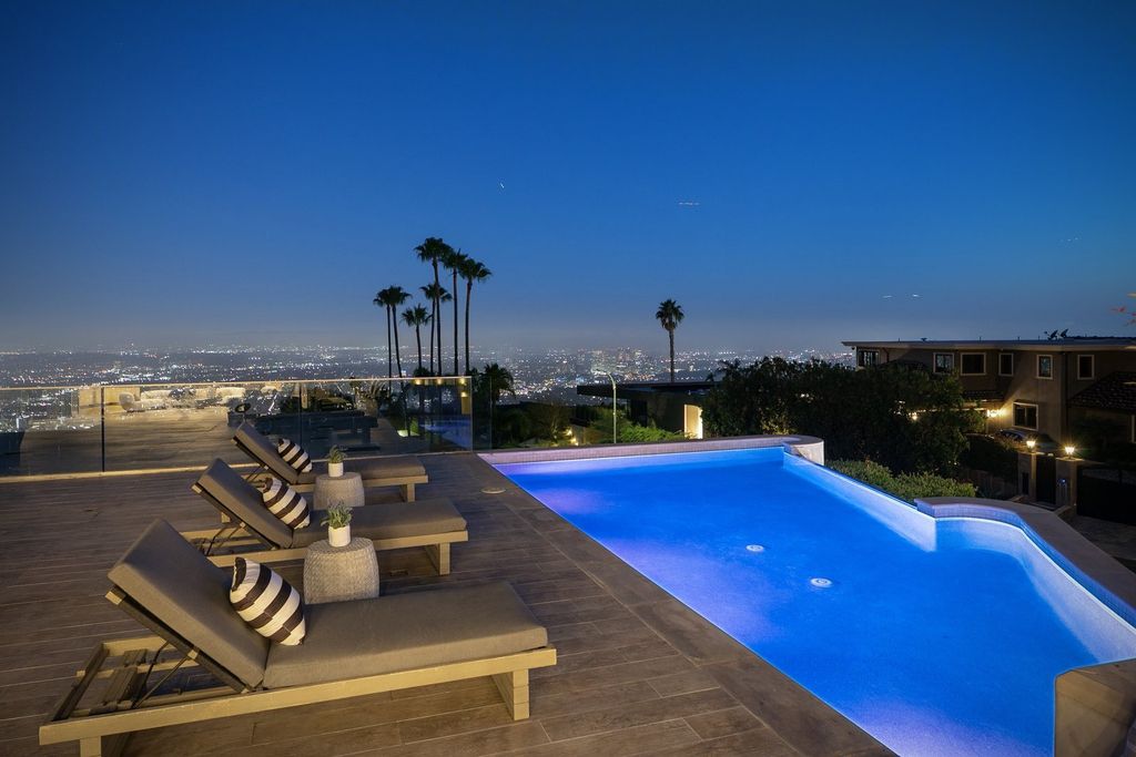 The Los Angeles Home is a custom built estate has 7,000 square foot of outdoor entertainment terraces with the views of the world now available for sale. This home located at 9369 Nightingale Dr, Los Angeles, California