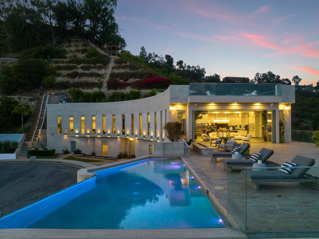 The Los Angeles Home is a custom built estate has 7,000 square foot of outdoor entertainment terraces with the views of the world now available for sale. This home located at 9369 Nightingale Dr, Los Angeles, California