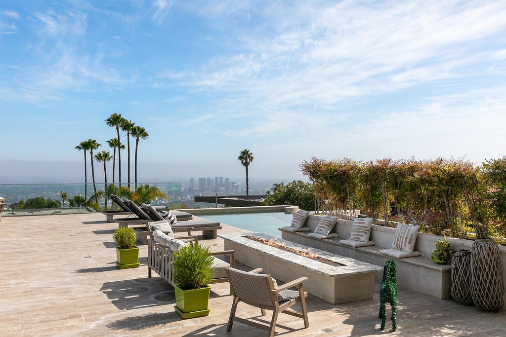 The Los Angeles Home is a custom built estate has 7,000 square foot of outdoor entertainment terraces with the views of the world now available for sale. This home located at 9369 Nightingale Dr, Los Angeles, California