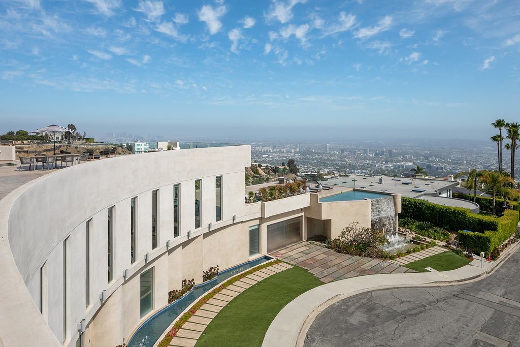 The Los Angeles Home is a custom built estate has 7,000 square foot of outdoor entertainment terraces with the views of the world now available for sale. This home located at 9369 Nightingale Dr, Los Angeles, California