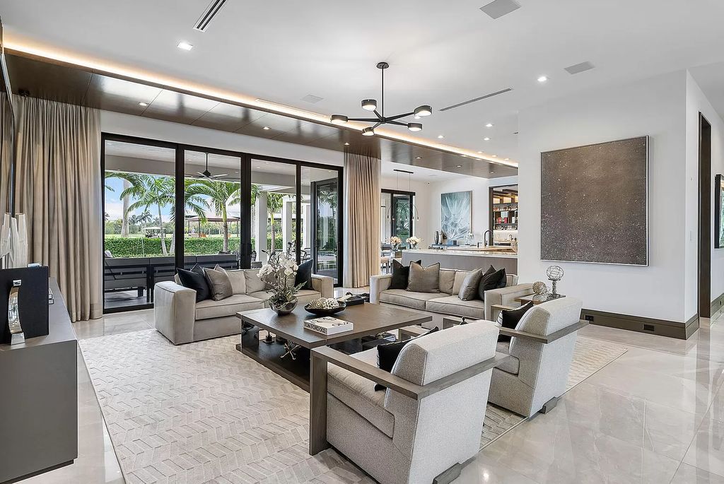 The Home in Boca Raton is a turnkey 2020 SRD Building Corp home offers a slice of paradise with 102′ of golf course frontage now available for sale. This home located at 170 Royal Palm Way, Boca Raton, Florida