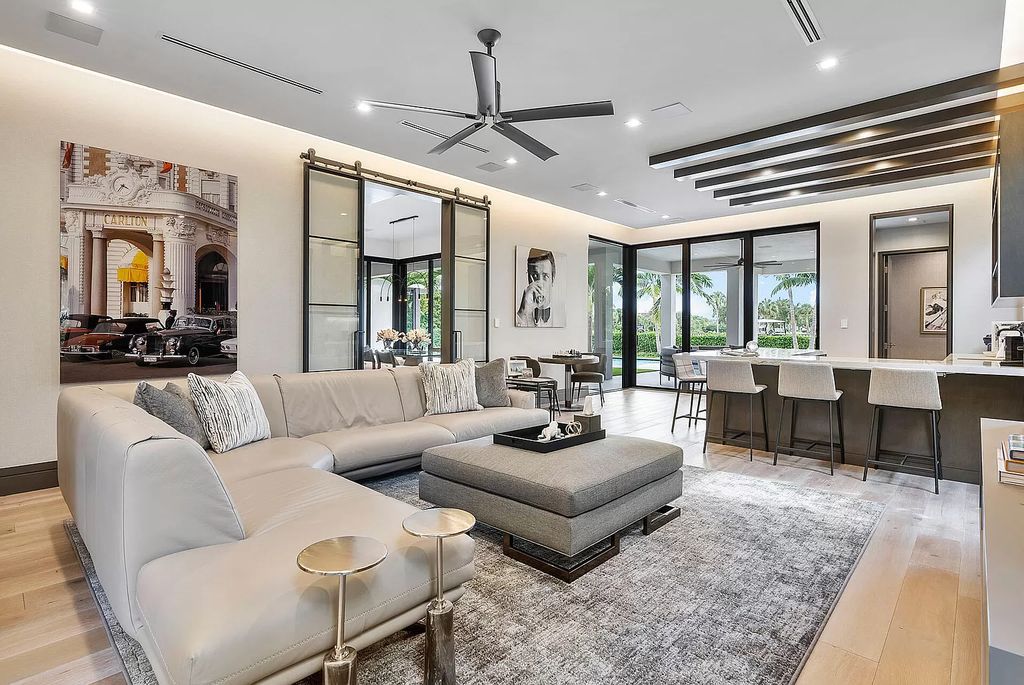 The Home in Boca Raton is a turnkey 2020 SRD Building Corp home offers a slice of paradise with 102′ of golf course frontage now available for sale. This home located at 170 Royal Palm Way, Boca Raton, Florida