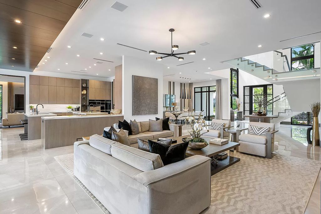 The Home in Boca Raton is a turnkey 2020 SRD Building Corp home offers a slice of paradise with 102′ of golf course frontage now available for sale. This home located at 170 Royal Palm Way, Boca Raton, Florida