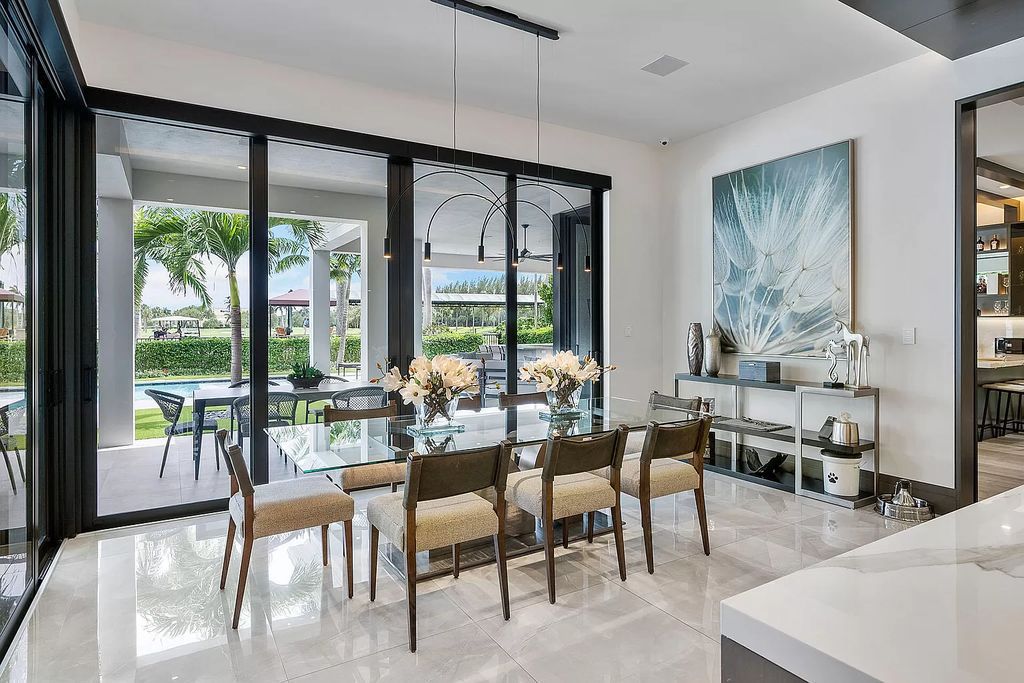 The Home in Boca Raton is a turnkey 2020 SRD Building Corp home offers a slice of paradise with 102′ of golf course frontage now available for sale. This home located at 170 Royal Palm Way, Boca Raton, Florida