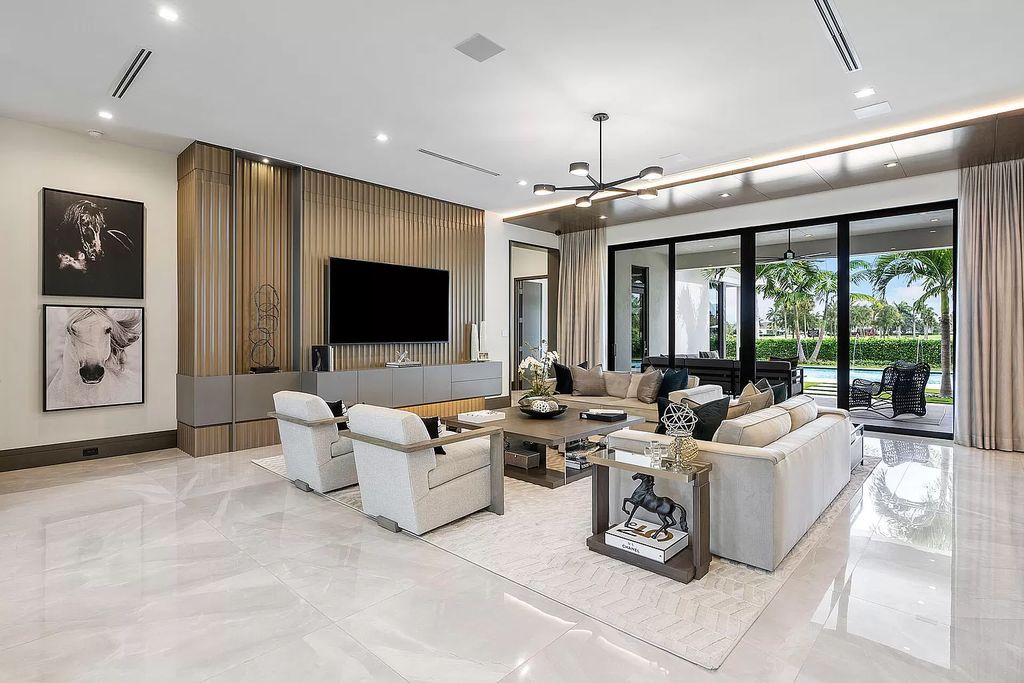 The Home in Boca Raton is a turnkey 2020 SRD Building Corp home offers a slice of paradise with 102′ of golf course frontage now available for sale. This home located at 170 Royal Palm Way, Boca Raton, Florida