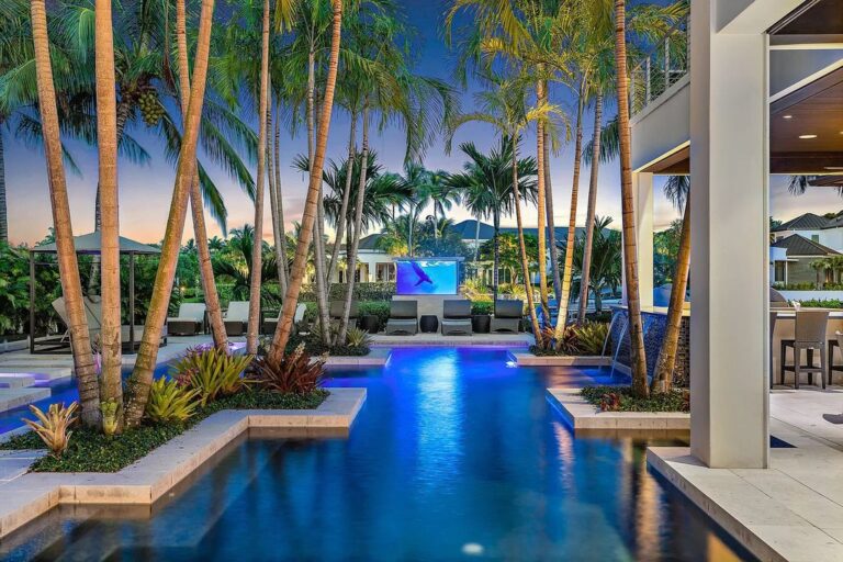 This $15,000,000 Waterfront Estate Home in Jupiter has Resort pool and Patio with Amazing Water Views