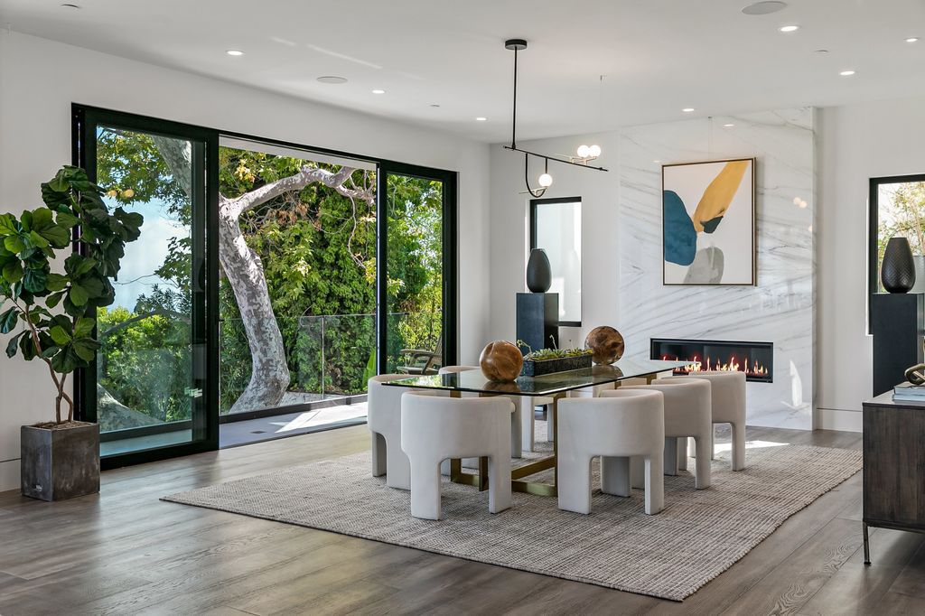 The Home in Pacific Palisades is a new contemporary home personifies abstract reductionist minimalism perched above the trees in the highly coveted Riviera now available for sale. This home located at 1635 Casale Rd, Pacific Palisades, California