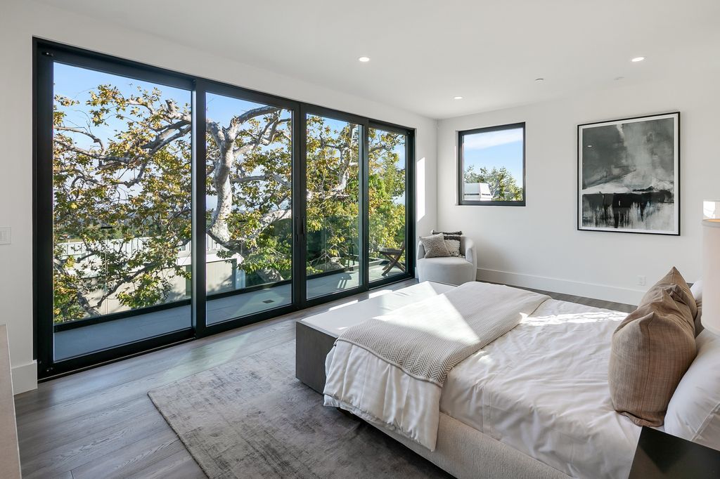 The Home in Pacific Palisades is a new contemporary home personifies abstract reductionist minimalism perched above the trees in the highly coveted Riviera now available for sale. This home located at 1635 Casale Rd, Pacific Palisades, California